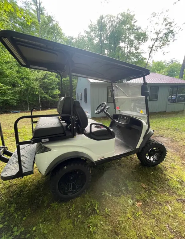 MadJax White Lifted Off-Road Golf Cart with Knobby Tires - Image 2